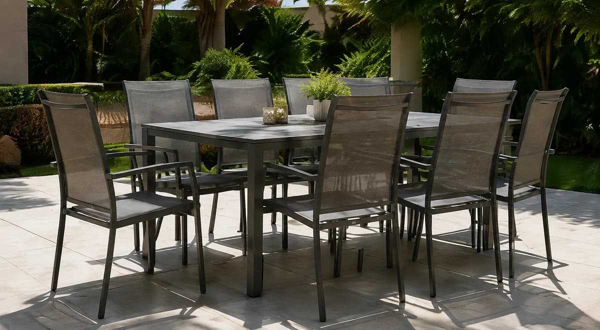 Illustration of woven-mesh dining chairs on a tropical outdoor terrace